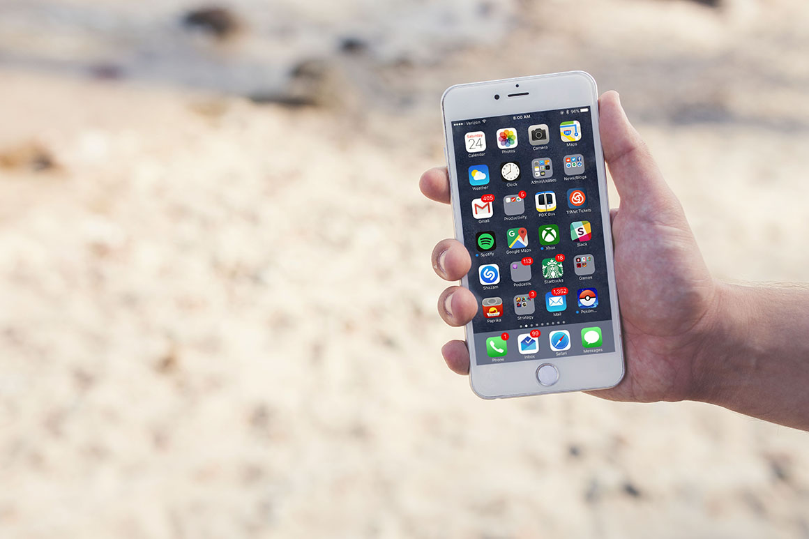 Free Phone in Hands Mockups